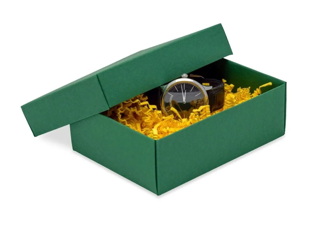Zielone pudełko świąteczne z zegarkiem w środku