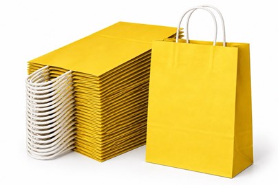 Zestaw 10 żółtych toreb papierowych A4 o wymiarach 240 × 100 × 320 mm, gramaturze 90 g/m² i pojemności 7,5 l, z uchwytami ze sznurka papierowego oraz